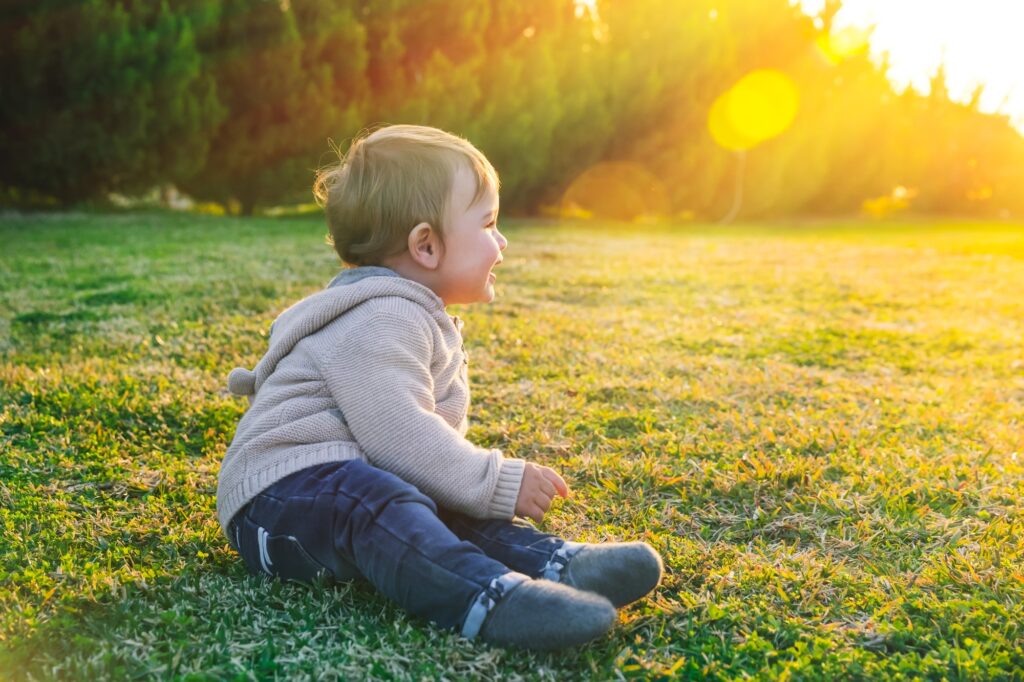 Adorable baby playing outdoors